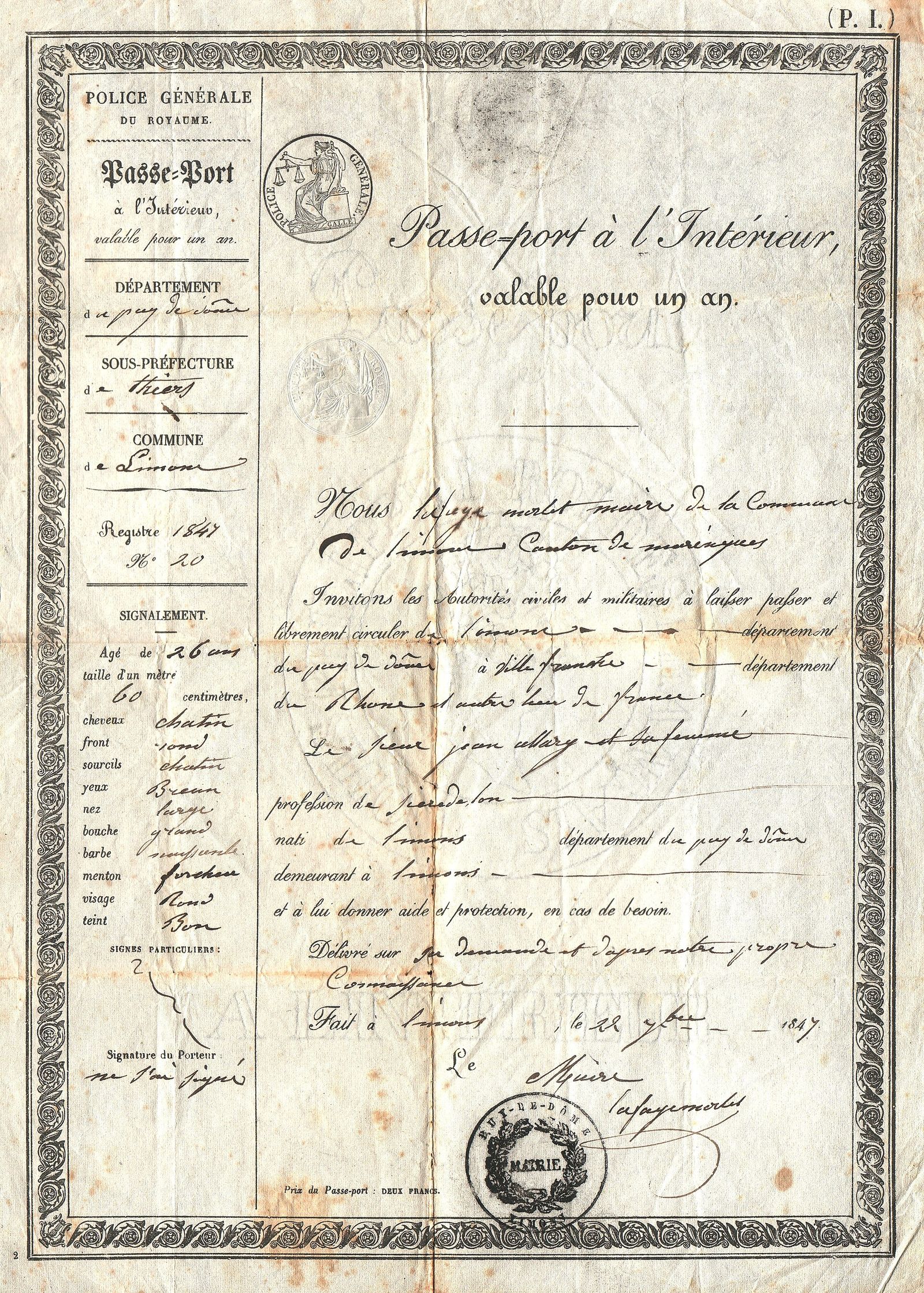 A passport and travel documents on a desk