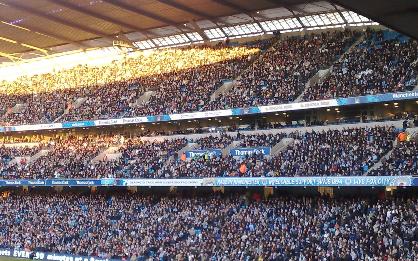 Supporters filling a football stadium