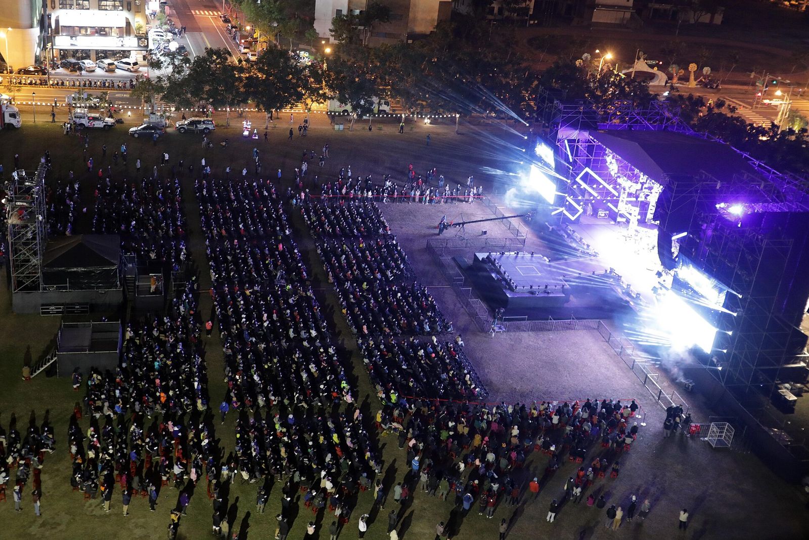 An open-air night concert crowd
