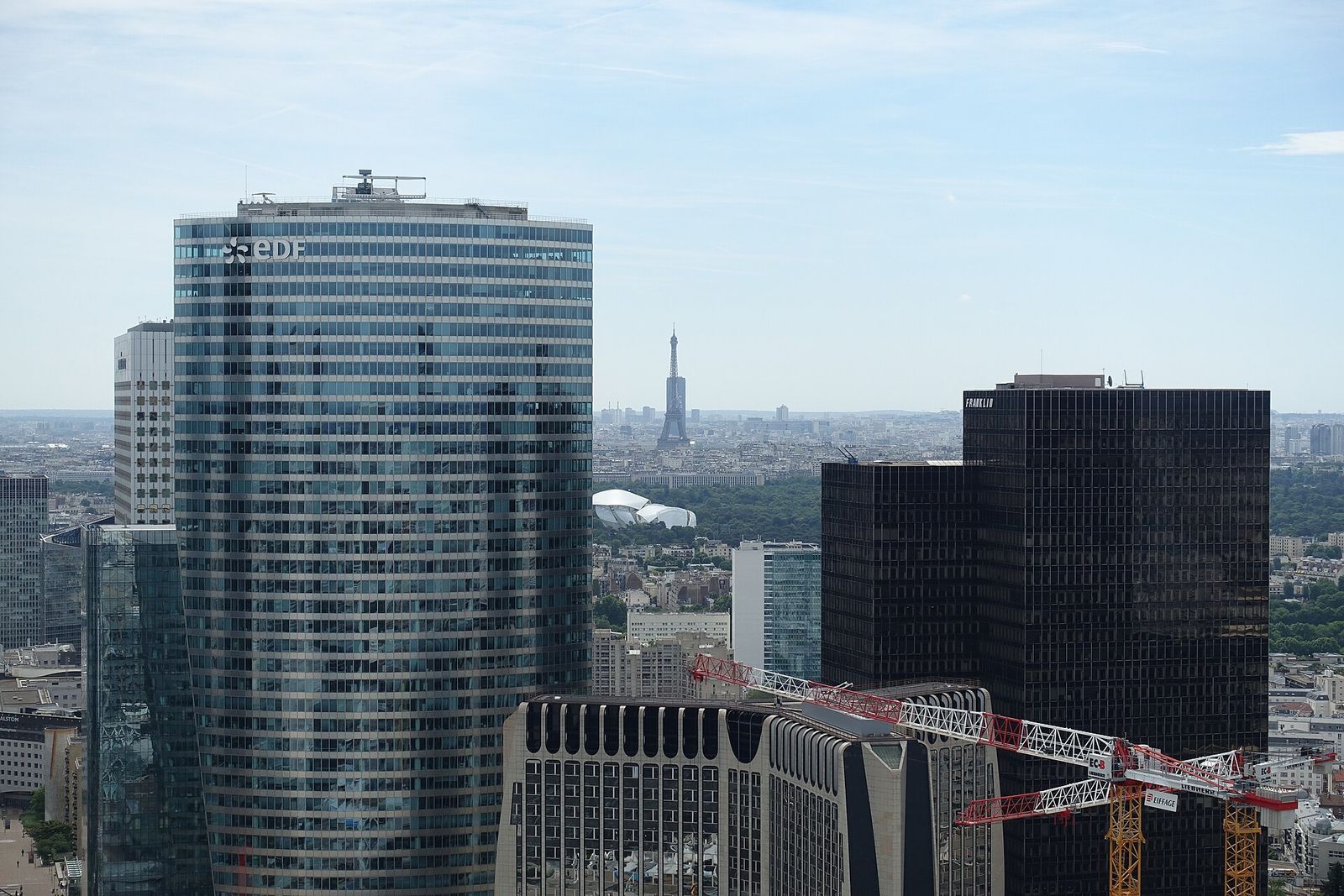Paris rooftops with the Eiffel Tower in the distance